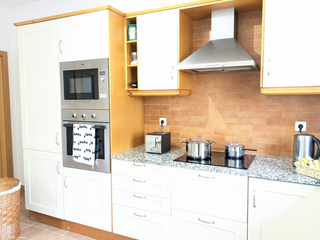 Kitchen (view of fridge, oven and hob)